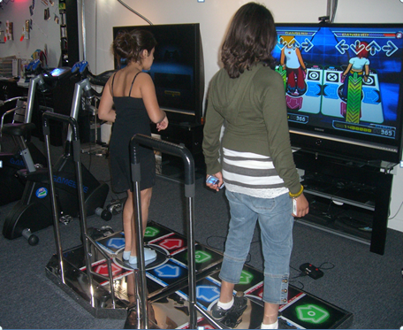 Children participating in an interactive fitness activity