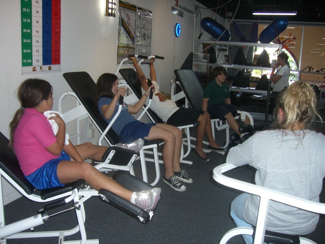 Children using youth fitness equipment in the original facility